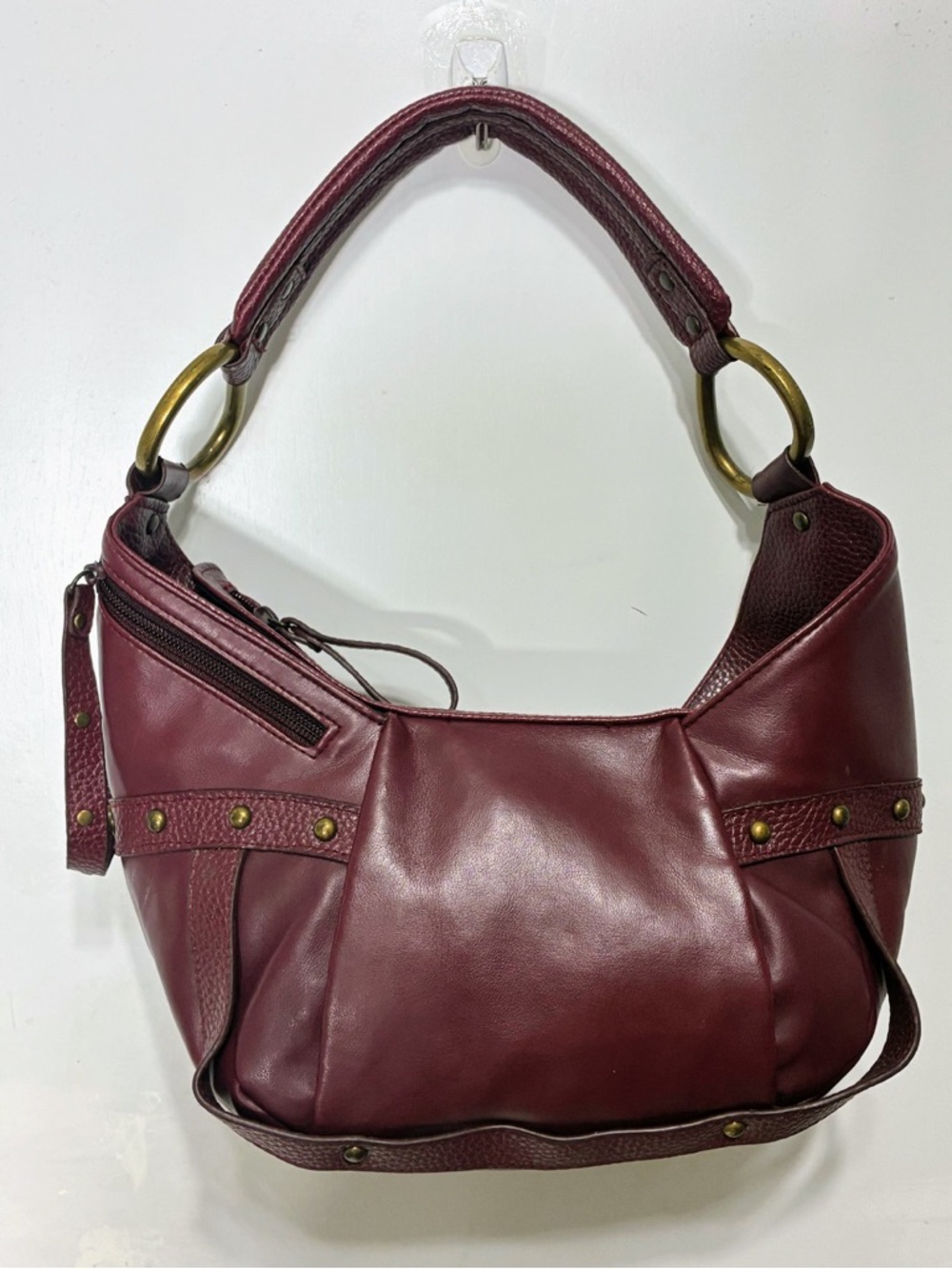 Women’s Burgundy Leather Satchel with Brass Ring Accents unusual
